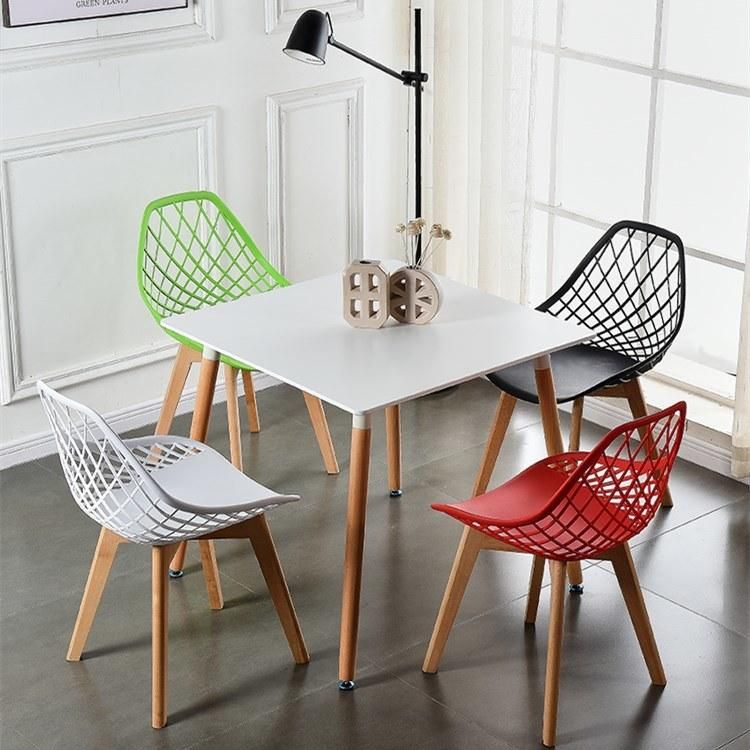 Hot Sale in Poland Plastic Chairs Polypropylene Dining Chair with Wooden Legs