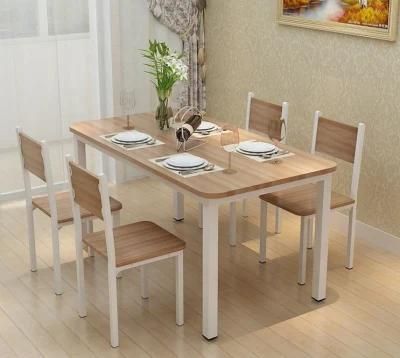 Stylish, Simple and Affordable Restaurant with Wooden Table and Four Chairs