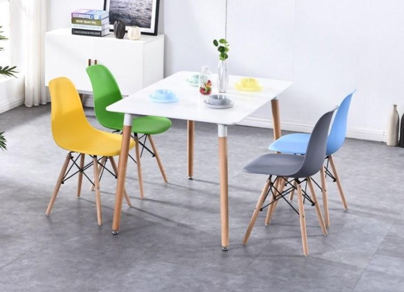 Import Fancy Modern White Wooden Legs Dinner Plastic Chair in China Eam PP Shell Dinning Kitchen Plastic Dining Chair for Sale